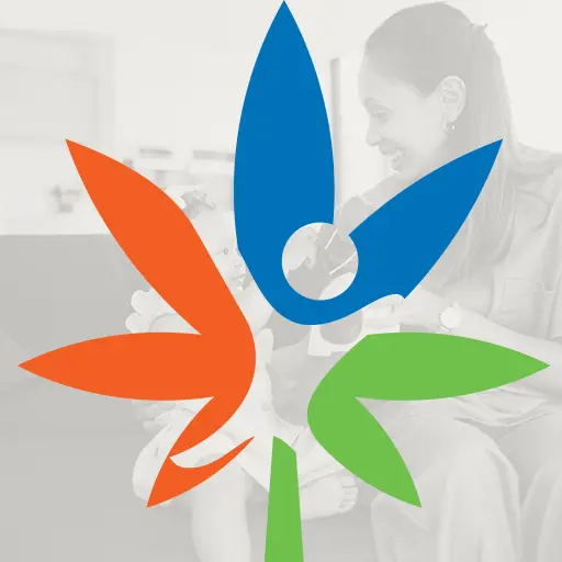 Clinic logo over a faded photo of a doctor consulting with a smiling patient